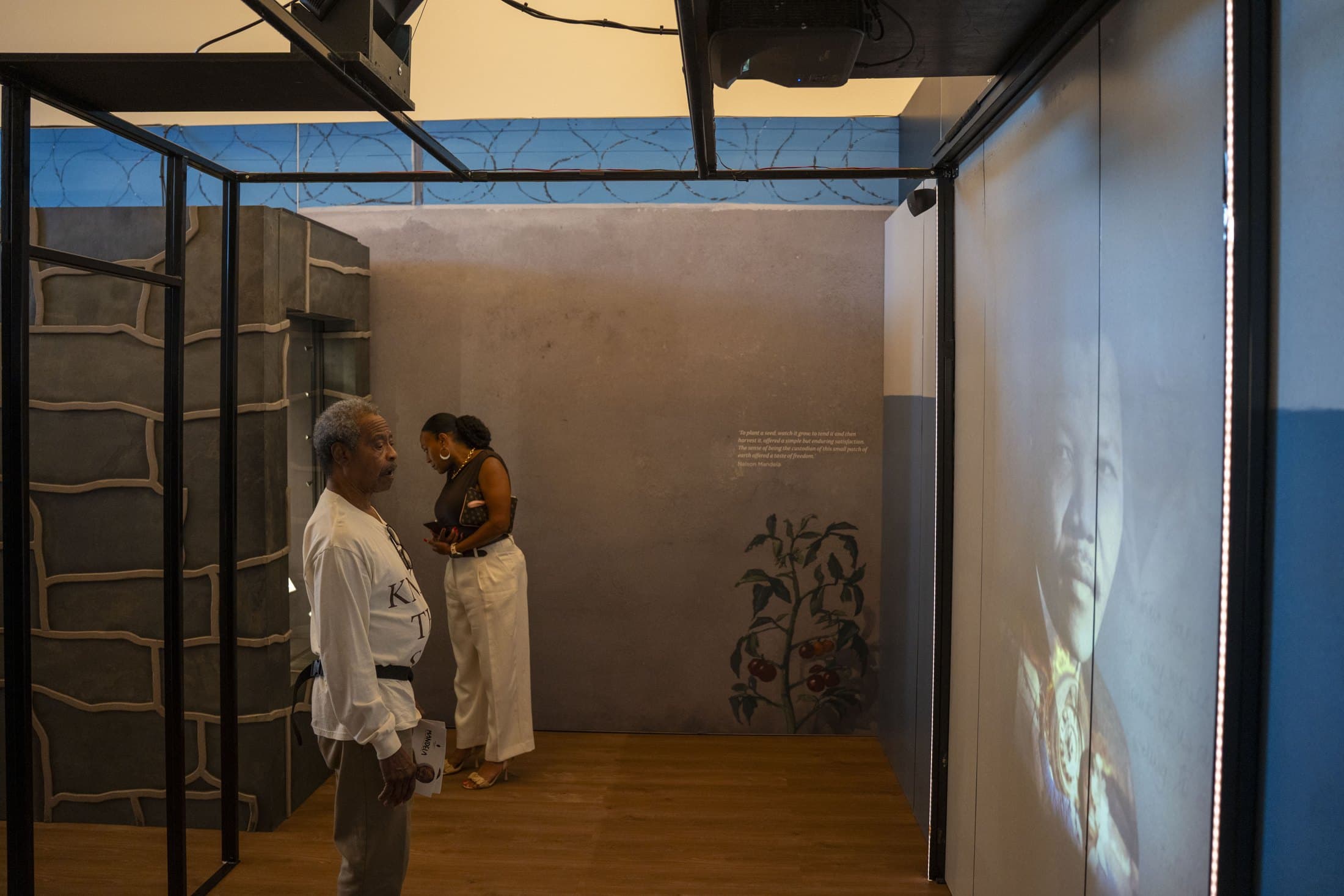 Visitors in the exhibition's gallery on Mandela's years in prison. Photo by Lawrence Jenkins, courtesy of the African American Museum, Dallas